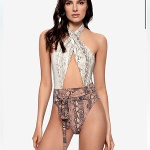 PQ one piece bathing suit. Never worn size M